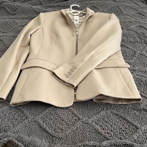 Tahari double zippers for easy access to pants or skirt pockets.